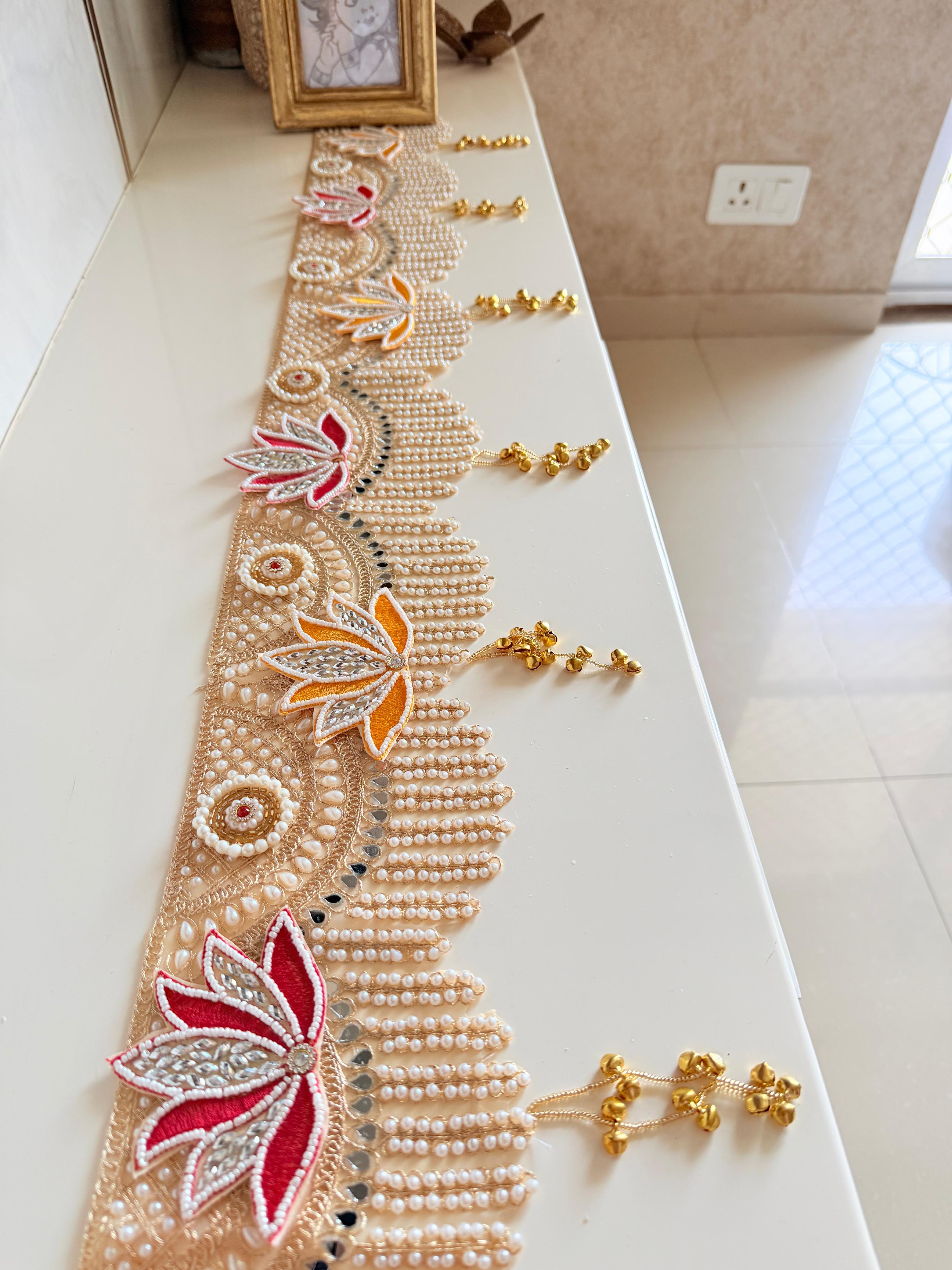 Lotus Toran — Coral & Gold